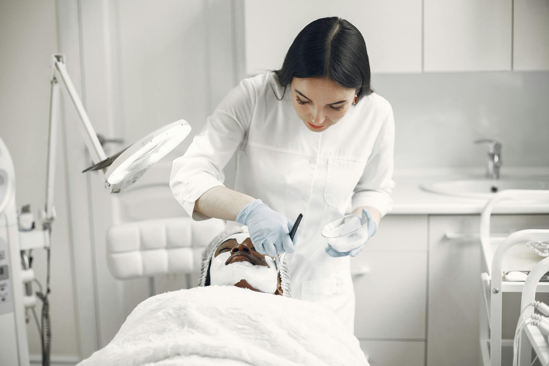 Luxury aesthetic clinic treatment room prepared for a med spa filler appointment.
