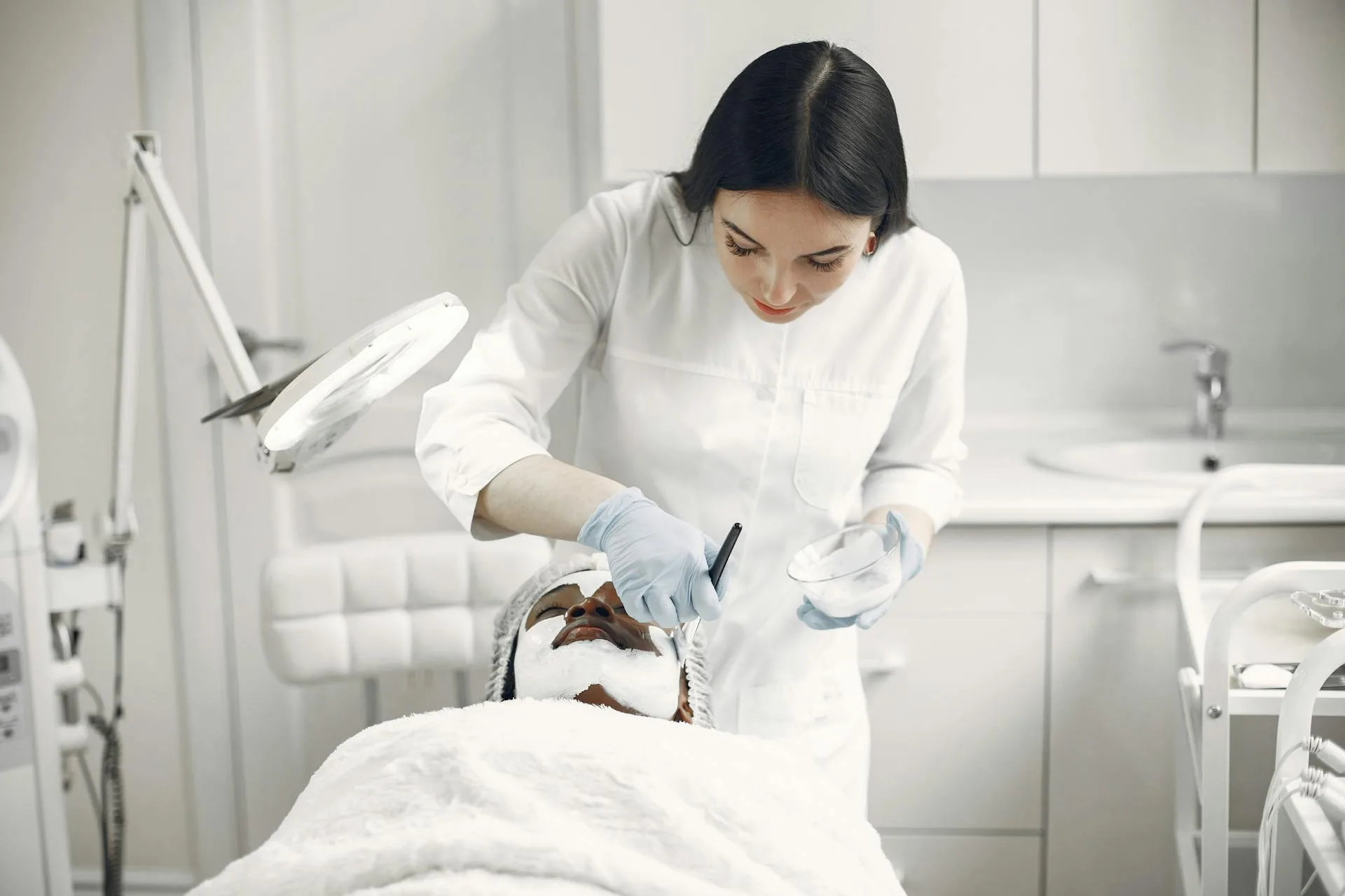 Luxury aesthetic clinic treatment room prepared for a med spa filler appointment.